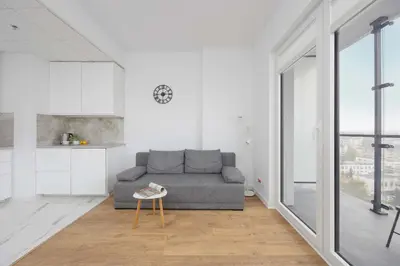 Część wypoczynkowa w obiekcie Apartment Kasprzaka near Metro Płocka with AC by Noclegi Renters