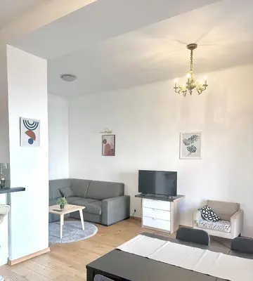 Część wypoczynkowa w obiekcie Castle & Culture Stay - Modern 2-Room with Balcony Apartment in Warsaw Center