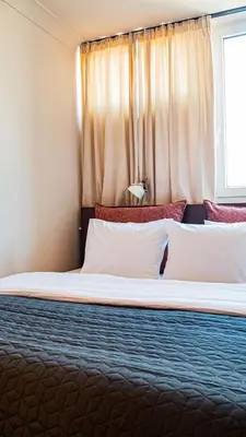 Łóżko lub łóżka w pokoju w obiekcie Stylowy Apartament Warszawski