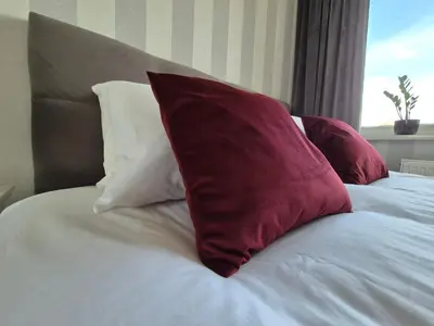 Łóżko lub łóżka w pokoju w obiekcie Art Lux Apartments - Dygata