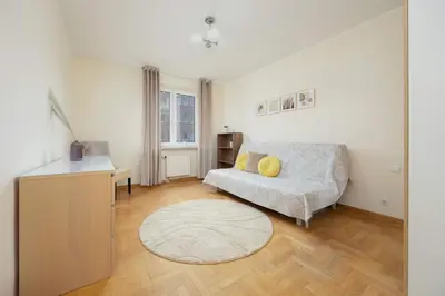 Część wypoczynkowa w obiekcie Spacious 4-Bedroom Apartment by Noclegi Renters