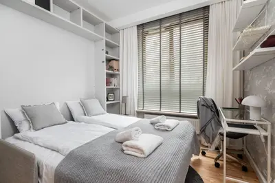 Łóżko lub łóżka w pokoju w obiekcie Aura Premium Apartment Mokotow