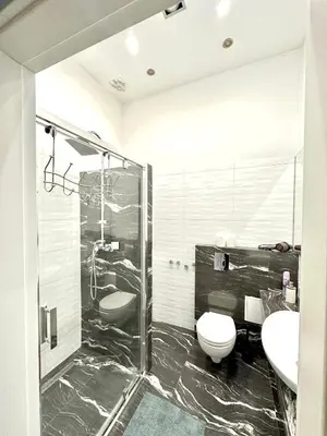 Łazienka w obiekcie Nowy Swiat Prestige - Elegant 2-room Apartment in City Center
