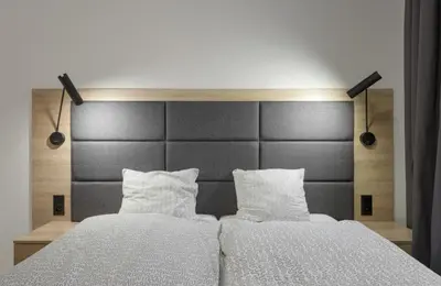 Łóżko lub łóżka w pokoju w obiekcie Moduo by Executive Suites
