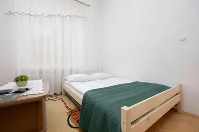 Łóżko lub łóżka w pokoju w obiekcie Nowy Świat Apartament w Centrum Warszawy by Noclegi Renters