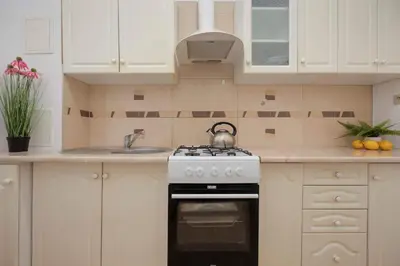 Kuchnia lub aneks kuchenny w obiekcie Nowy Świat Apartament w Centrum Warszawy by Noclegi Renters