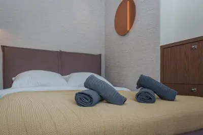 Łóżko lub łóżka w pokoju w obiekcie Czackiego 19 - studio - Better Rental