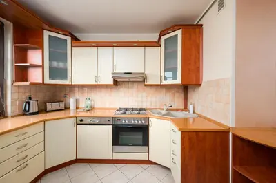 Kuchnia lub aneks kuchenny w obiekcie Tarchomin Standard Apartment by BookingHost