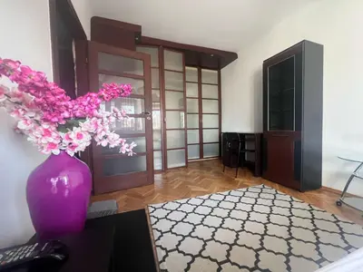 Łóżko lub łóżka w pokoju w obiekcie Plac Bankowy Apartment, Metro
