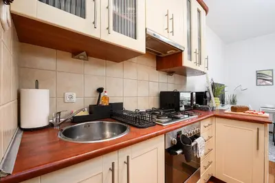 Kuchnia lub aneks kuchenny w obiekcie P&O Serviced Apartments Mazowiecka