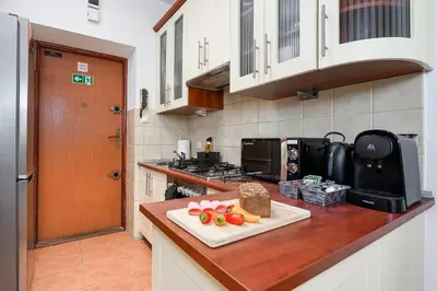 Kuchnia lub aneks kuchenny w obiekcie P&O Serviced Apartments Mazowiecka