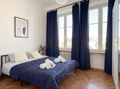 Łóżko lub łóżka w pokoju w obiekcie Comfort Apartments Warsaw near Central Station on Złota Street