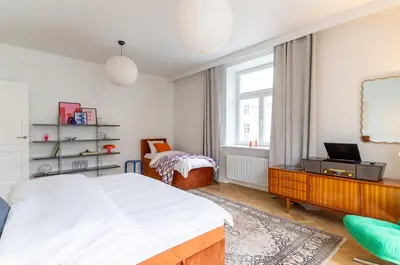 Łóżko lub łóżka w pokoju w obiekcie Warsaw Concierge Ochota