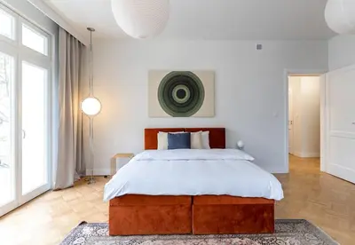 Łóżko lub łóżka w pokoju w obiekcie Warsaw Concierge Ochota