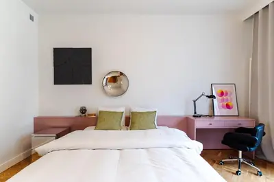 Łóżko lub łóżka w pokoju w obiekcie Warsaw Concierge Ochota
