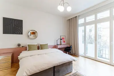 Łóżko lub łóżka w pokoju w obiekcie Warsaw Concierge Ochota