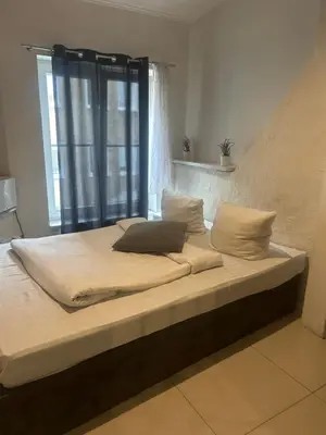 Łóżko lub łóżka w pokoju w obiekcie Wilcza double room small Apartment by best price City Center