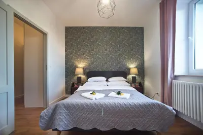 Łóżko lub łóżka w pokoju w obiekcie P&O Apartments Gdańska I