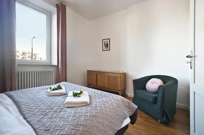 Łóżko lub łóżka w pokoju w obiekcie P&O Apartments Gdańska I