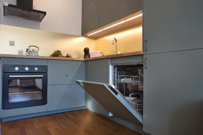 Kuchnia lub aneks kuchenny w obiekcie P&O Apartments Gdańska I