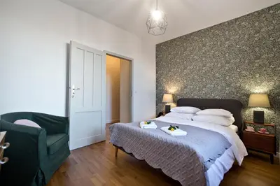 Łóżko lub łóżka w pokoju w obiekcie P&O Apartments Gdańska I