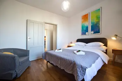 Łóżko lub łóżka w pokoju w obiekcie P&O Apartments Gdańska II