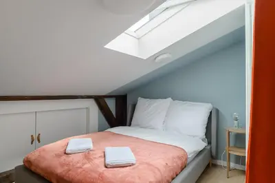 Łóżko lub łóżka w pokoju w obiekcie P&O Apartments Gdańska IV