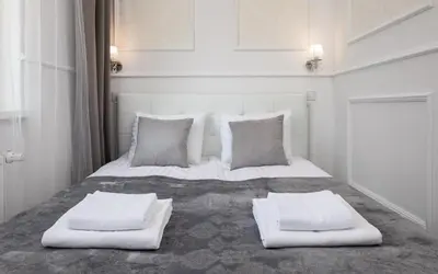 Łóżko lub łóżka w pokoju w obiekcie Glamour Apartment Miła with Balcony in Warsaw by Noclegi Renters