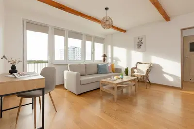 Część wypoczynkowa w obiekcie Bright Apartment Bogusławskiego Perfect for Remote Work by Noclegi Renters