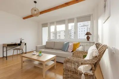 Część wypoczynkowa w obiekcie Bright Apartment Bogusławskiego Perfect for Remote Work by Noclegi Renters