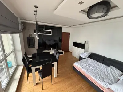 Łóżko lub łóżka w pokoju w obiekcie Apartament Praga Północ