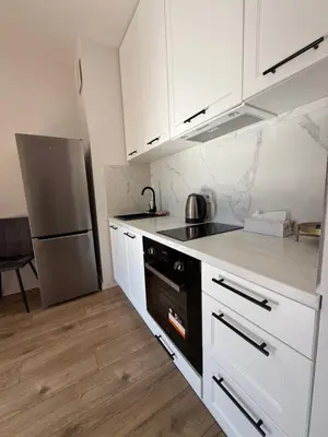 Kuchnia lub aneks kuchenny w obiekcie Apartment near Chopin Airport by Real Apartment