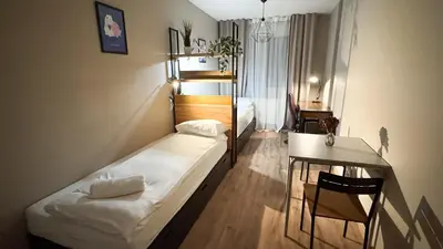 Łóżko lub łóżka w pokoju w obiekcie City Haven Comfort Rooms #self check-in #essentials included