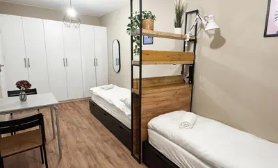 Łóżko lub łóżka w pokoju w obiekcie City Haven Comfort Rooms #self check-in #essentials included