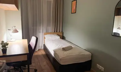 Łóżko lub łóżka w pokoju w obiekcie City Haven Comfort Rooms #self check-in #essentials included
