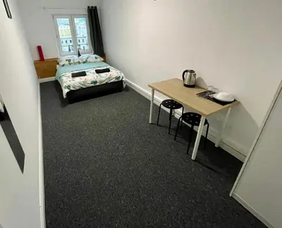 Łóżko lub łóżka w pokoju w obiekcie Fantastic-Inn Warszawa - Chmielna