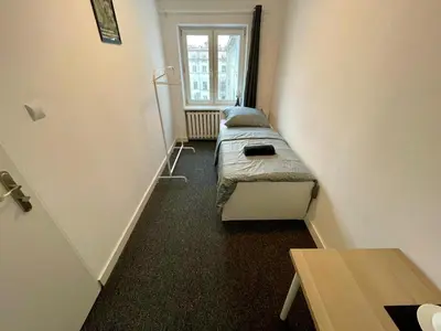 Łóżko lub łóżka w pokoju w obiekcie Fantastic-Inn Warszawa - Chmielna