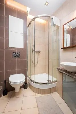 Łazienka w obiekcie Wilcza City Centre Cosy Apartment by BookingHost