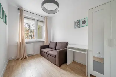 Część wypoczynkowa w obiekcie Mokotów Modzelewskiego Modern Apartment by BookingHost