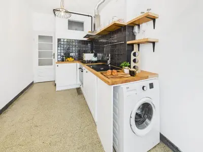 Kuchnia lub aneks kuchenny w obiekcie Cosy Studio Kasprowicza in Warsaw by Noclegi Renters