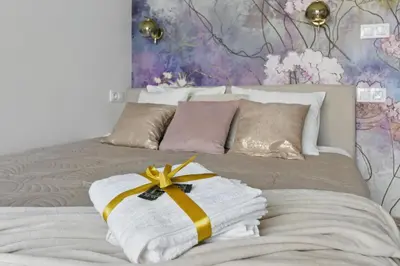 Łóżko lub łóżka w pokoju w obiekcie Lovely BOUTIQUE studios 2x1BR nearby Chopin Airport & 15 min to Centre by tram