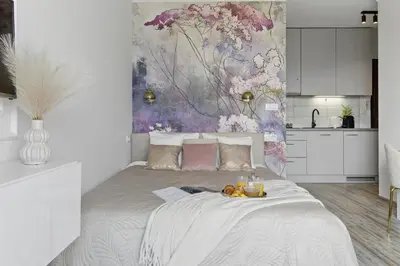 Łóżko lub łóżka w pokoju w obiekcie Lovely BOUTIQUE studios 2x1BR nearby Chopin Airport & 15 min to Centre by tram