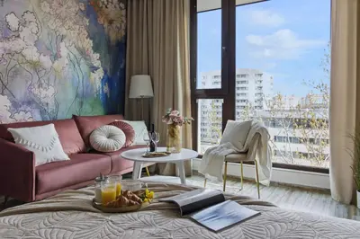 Część wypoczynkowa w obiekcie Lovely BOUTIQUE studios 2x1BR nearby Chopin Airport & 15 min to Centre by tram