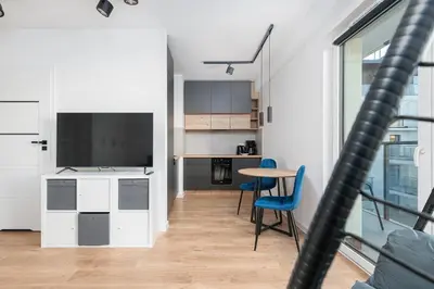 Kuchnia lub aneks kuchenny w obiekcie RentPlanet - Apartamenty Ząbkowska