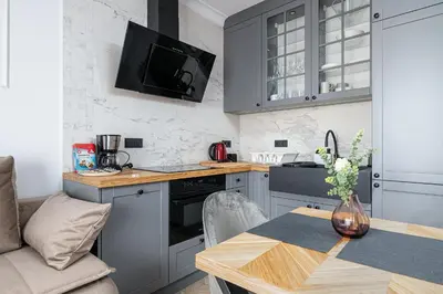 Kuchnia lub aneks kuchenny w obiekcie RentPlanet - Apartamenty Ząbkowska
