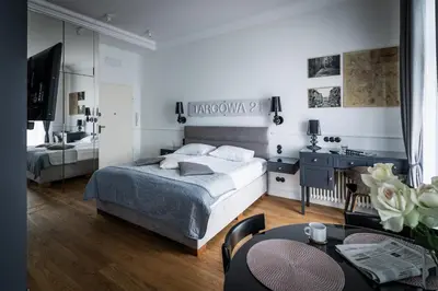 Łóżko lub łóżka w pokoju w obiekcie Boutique Studio, 5-minute walk to Stadion Narodowy Metro