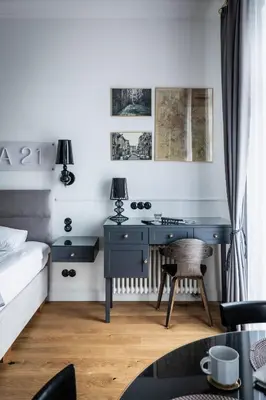 Łóżko lub łóżka w pokoju w obiekcie Boutique Studio, 5-minute walk to Stadion Narodowy Metro
