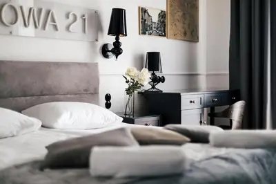 Łóżko lub łóżka w pokoju w obiekcie Boutique Studio, 5-minute walk to Stadion Narodowy Metro