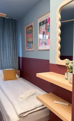 Łóżko lub łóżka w pokoju w obiekcie Blue Apartment with balcony - self check-in