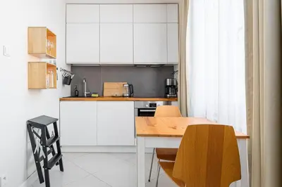 Kuchnia lub aneks kuchenny w obiekcie RentPlanet - Studio Białobrzeska